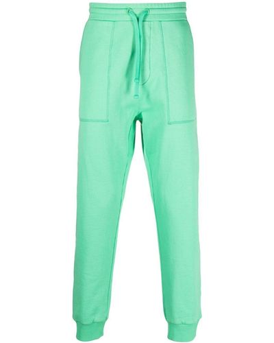 Nanushka Pantalones de talle alto ajustados - Verde