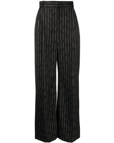 Alexander McQueen Weite Hose mit Nadelstreifen - Schwarz