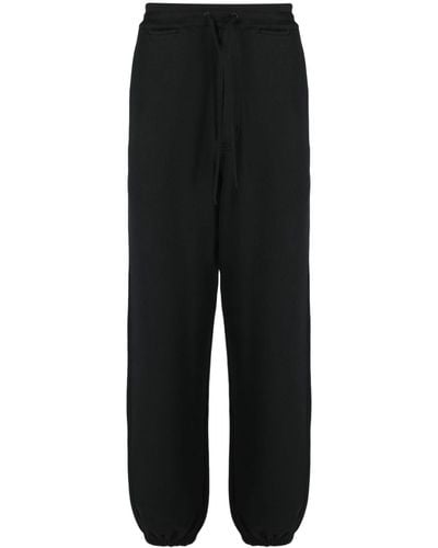 Y-3 Pantalones de chándal con parche del logo - Negro