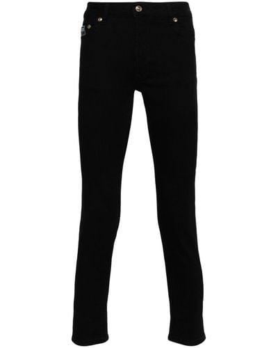 Versace Jeans Couture Jean skinny à taille basse - Noir