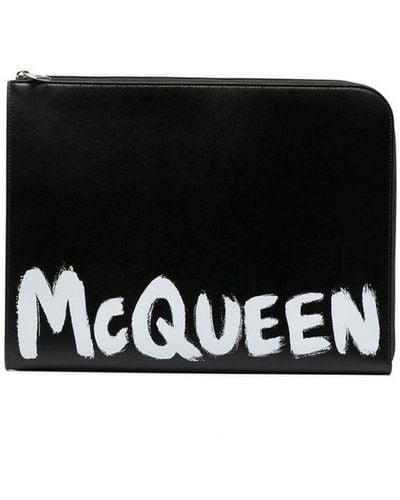 Alexander McQueen Portefeuille zippé à logo imprimé - Noir