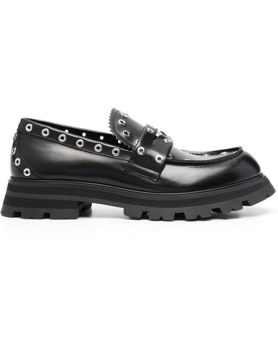 Alexander McQueen Mocasines con aplique de ojales - Negro