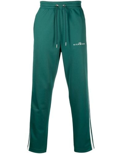 John Richmond Pantalones de chándal con logo estampado - Verde