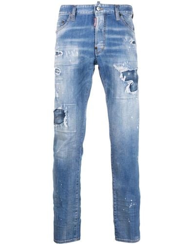 DSquared² Slim-Fit-Jeans mit Farbklecksen - Blau