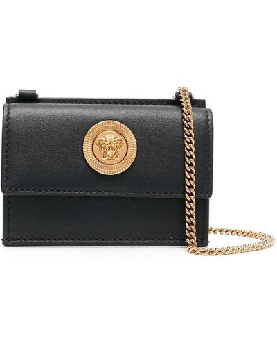 Versace Cartera estilo bandolera con logo - Negro