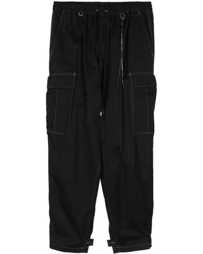 Mastermind Japan Pantalon imprimé à poches cargo - Noir