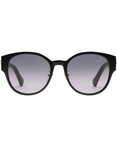 Gucci Sonnenbrille mit rundem Gestell - Braun