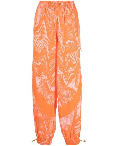 adidas By Stella McCartney Pantaloni sportivi a fiori - Arancione