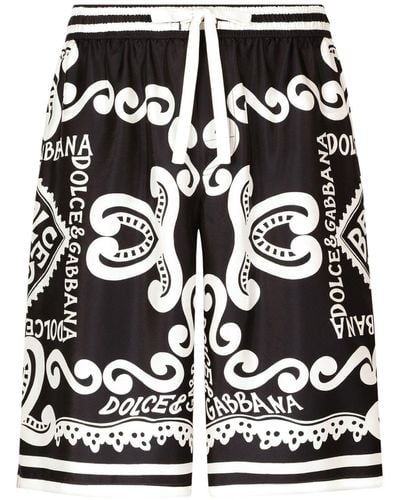 Dolce & Gabbana Bermudas con logo estampado - Negro