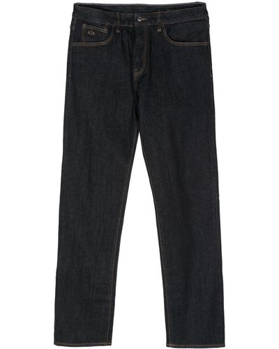 Armani Exchange Logo-embroidered tapered jeans - Blau