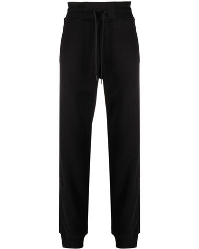 Versace Jeans Couture Pantalones de chándal con franja del logo - Negro