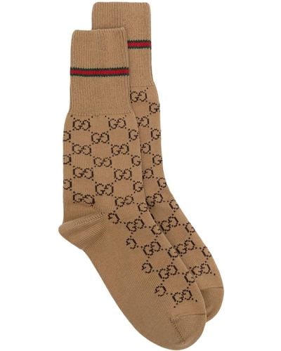 Gucci Chaussettes à motif GG - Marron