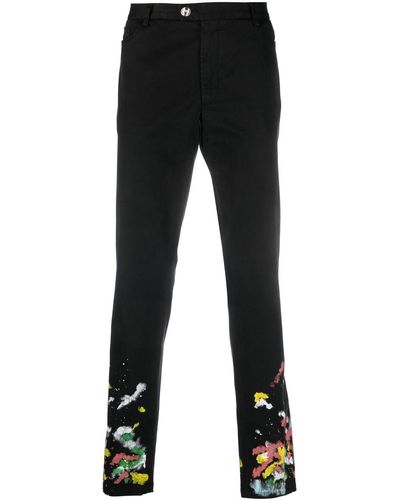 Philipp Plein Pantalones chinos con efecto de salpicadura de pintura - Negro