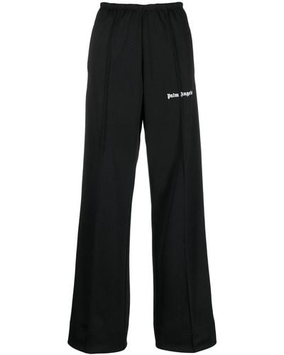Palm Angels Pantalones de chándal con logo estampado - Negro