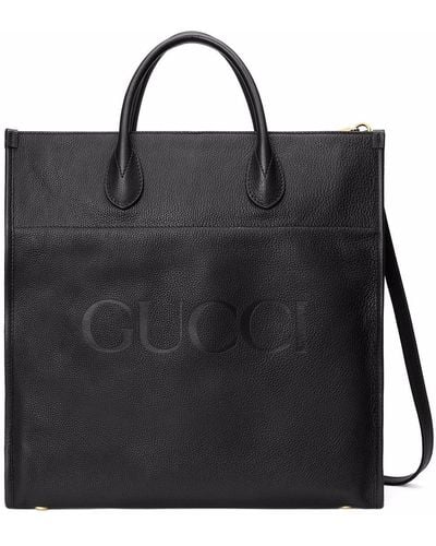 Gucci Sac cabas à logo embossé - Noir