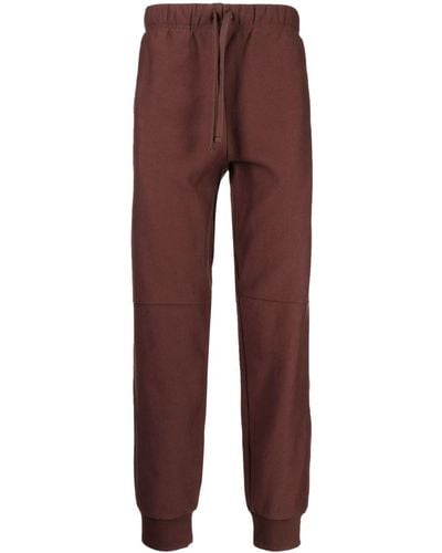 Carhartt Pantalon de jogging en coton à logo embossé - Rouge