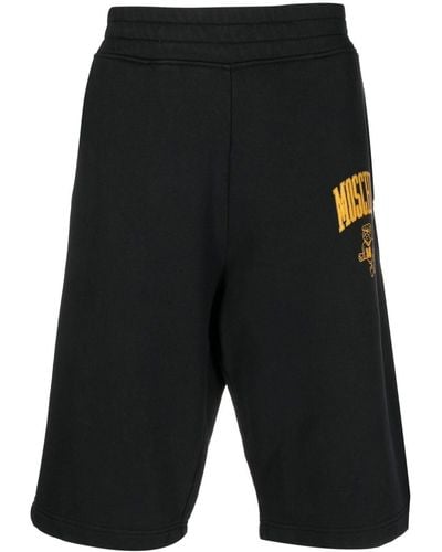 Moschino Pantalones de chándal con logo estampado - Negro