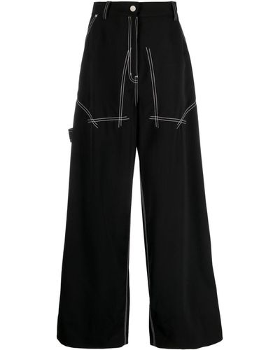 Stella McCartney Pantalones anchos con costuras en contraste - Negro