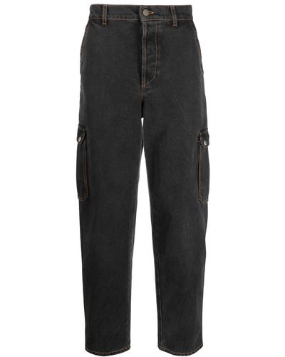 Alexander McQueen Tapered-Jeans mit Cargotaschen - Schwarz