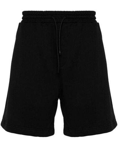 MSGM Short de sport en coton à logo imprimé - Noir