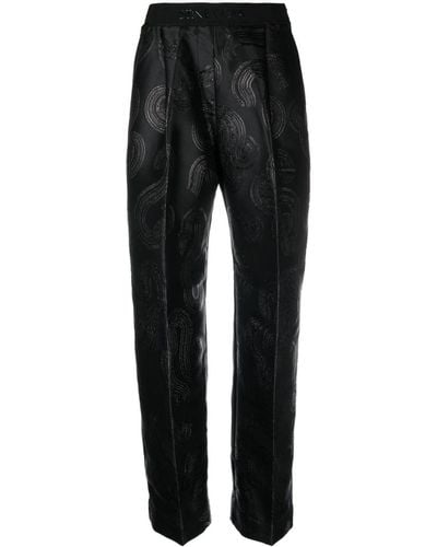 Stine Goya Pantalones Ciara con logo - Negro