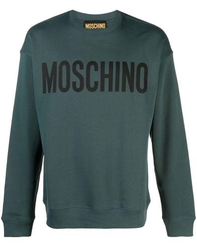 Moschino Sweater Met Logoprint - Groen