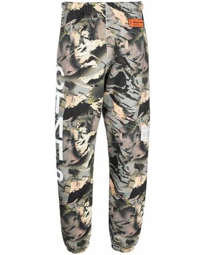 Heron Preston Pantalon de jogging СТИЛЬ à motif camouflage - Vert
