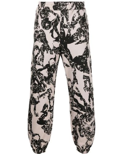 McQ Pantalones de chándal con estampado abstracto - Gris