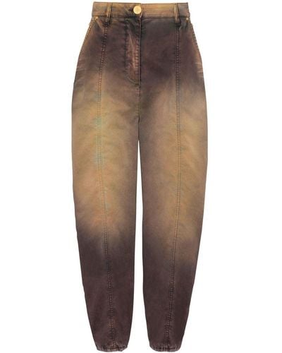 Balmain Tapered-Jeans mit Batik-Print - Braun