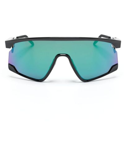 Oakley OO9237 BXTR Sonnenbrille im Sport-Style - Grün