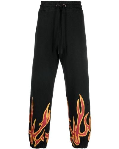 Palm Angels Pantalones joggers con detalle de llamas - Negro