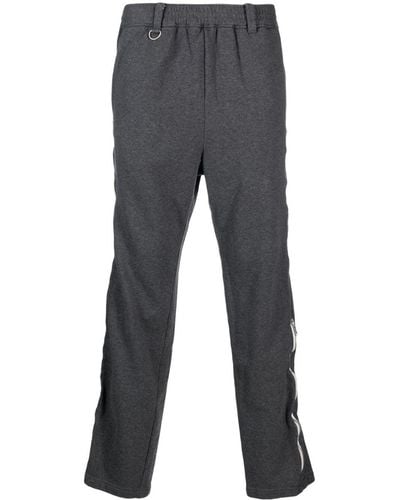 Undercoverism Logo-print Zipped Trousers - Grey