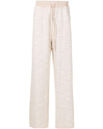Amir Slama Pantalones de chándal texturizados de x Mahaslama - Blanco