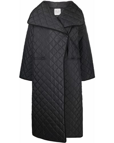 Totême Manteau oversize à design matelassé - Noir