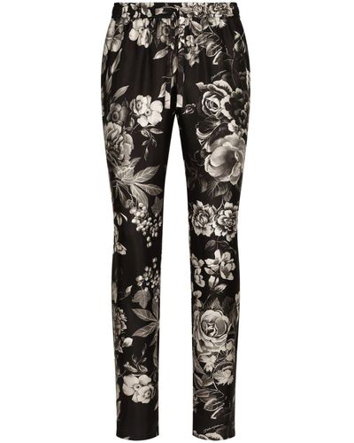 Dolce & Gabbana Jogginghose aus Seide mit Blumen-Print - Schwarz