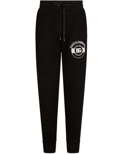 Dolce & Gabbana Pantalon de jogging en coton à logo imprimé - Noir