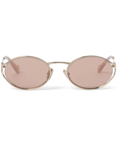 Miu Miu Gafas de sol Logo con montura oval - Rosa