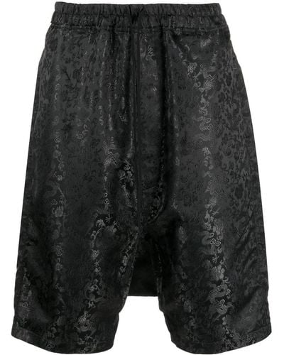 Junya Watanabe Baggy-Shorts mit botanischem Print - Schwarz