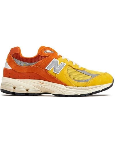 New Balance 2002R Sneakers mit Schnürung - Orange