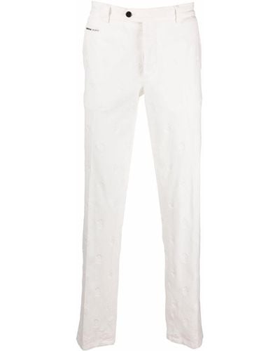 Philipp Plein Pantalones con bordado de calaveras - Blanco