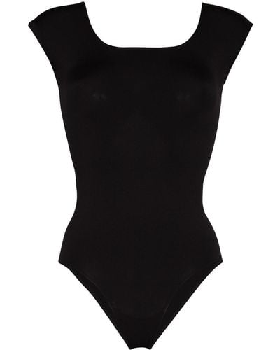 https://cdna.lystit.com/400/500/tr/photos/farfetch/5b0b339d/prism-black-Compassionate-Short-sleeve-Bodysuit.jpeg