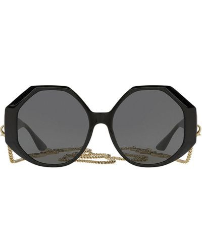 Versace Sonnenbrille mit geometrischem Gestell - Schwarz