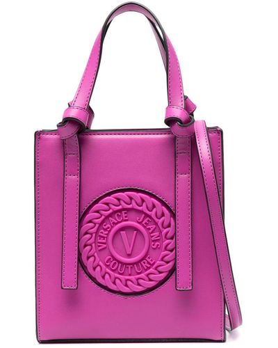 Versace Borsa tote mini con logo goffrato - Rosa