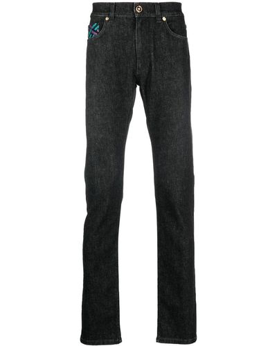 Versace Gerade Jeans mit La Greca-Muster - Schwarz