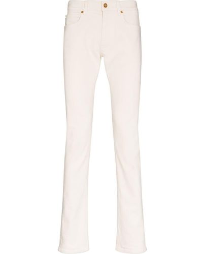 Versace Vaqueros slim con parche del logo - Blanco