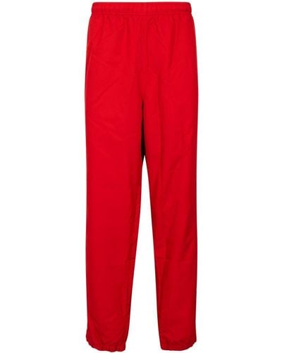 Supreme Pantalones de chándal de piqué de x Lacoste - Rojo