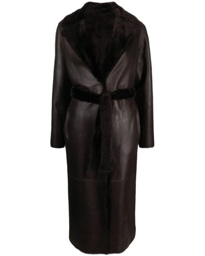 Yves Salomon Manteau réversible en cuir à taille ceinturée - Noir