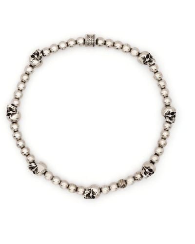 Alexander McQueen Bracelet de perles à breloques tête de mort - Métallisé