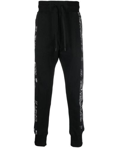 Versace Jeans Couture Pantalon de jogging en coton à imprimé baroque - Noir