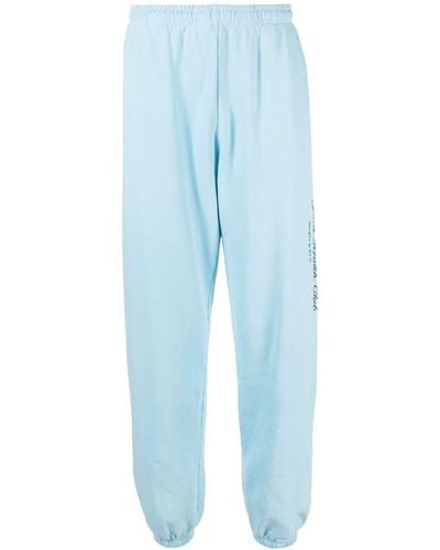 Sporty & Rich Pantalon de jogging en coton à logo imprimé - Bleu
